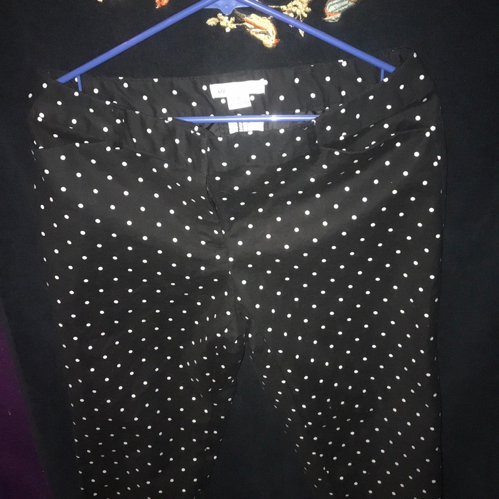 Black pants with white polkadots